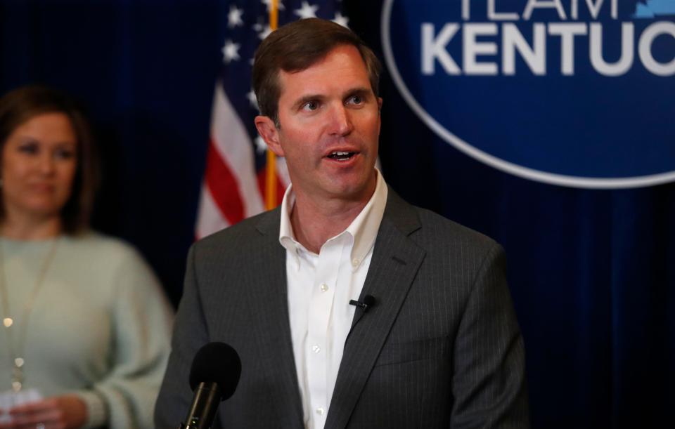 Gov. Andy Beshear before he signed Senate Bill 6, a bipartisan bill that codifies name, image, likeness agreement rights and provides a framework for students and colleges and universities. March 9, 2022