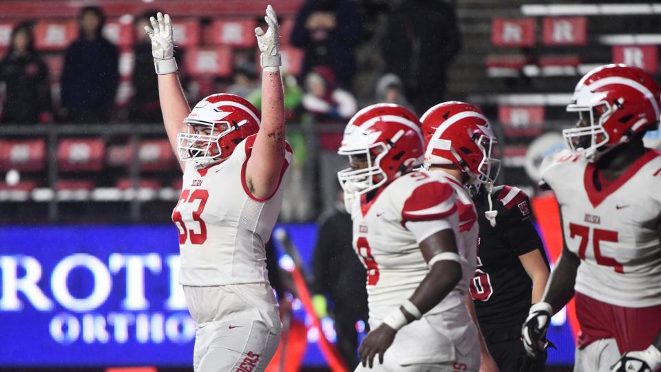 Delsea's Todd Murray, left, reacts after Delsea made a defensive stop during the Group 3 state championship football game between Delsea and West Essex played at Rutgers University in Piscataway on Sunday, November 26, 2023.