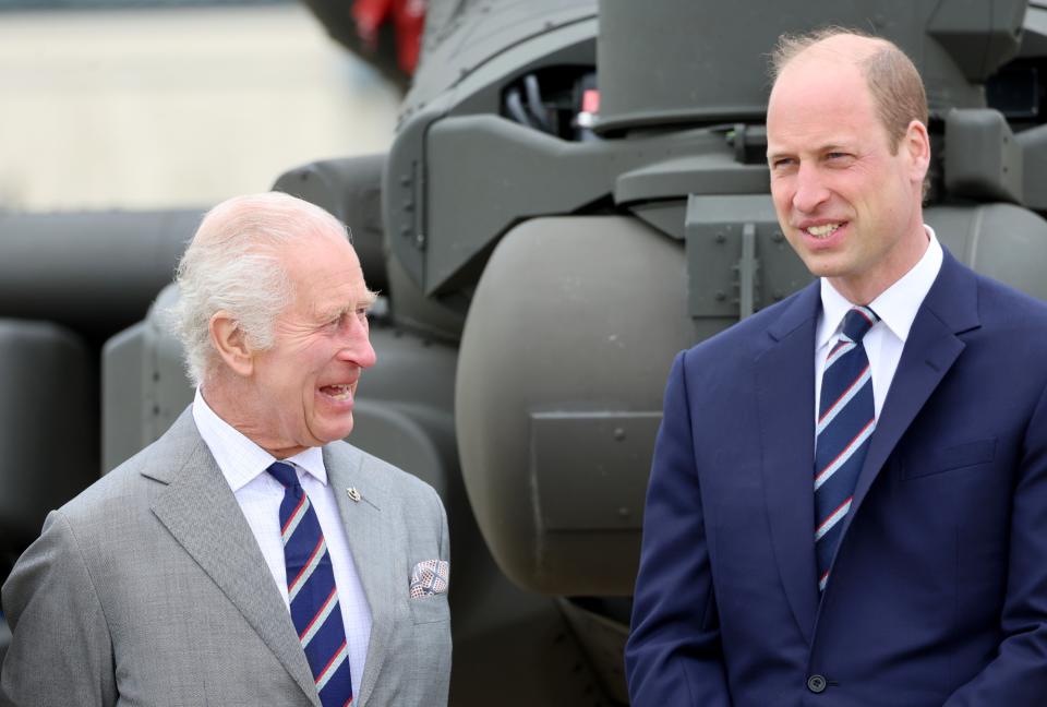 King Charles III, left, and Prince William