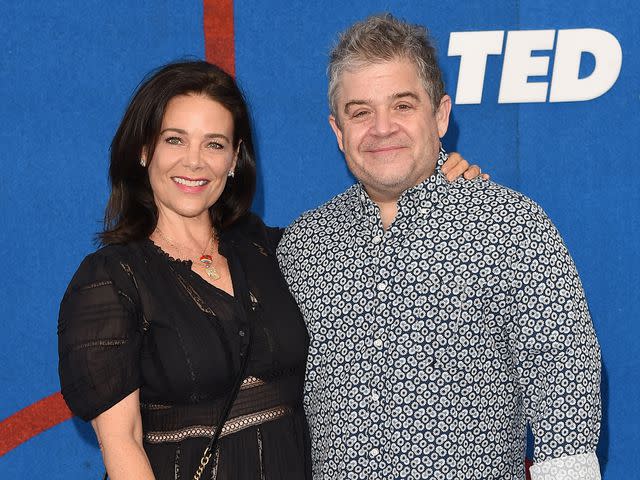 Axelle/Bauer-Griffin/FilmMagic Patton Oswalt and his wife, actress Meredith Salenger, attend Apple's "Ted Lasso" season 2 premiere at Pacific Design Center on July 15, 2021 in West Hollywood, California.