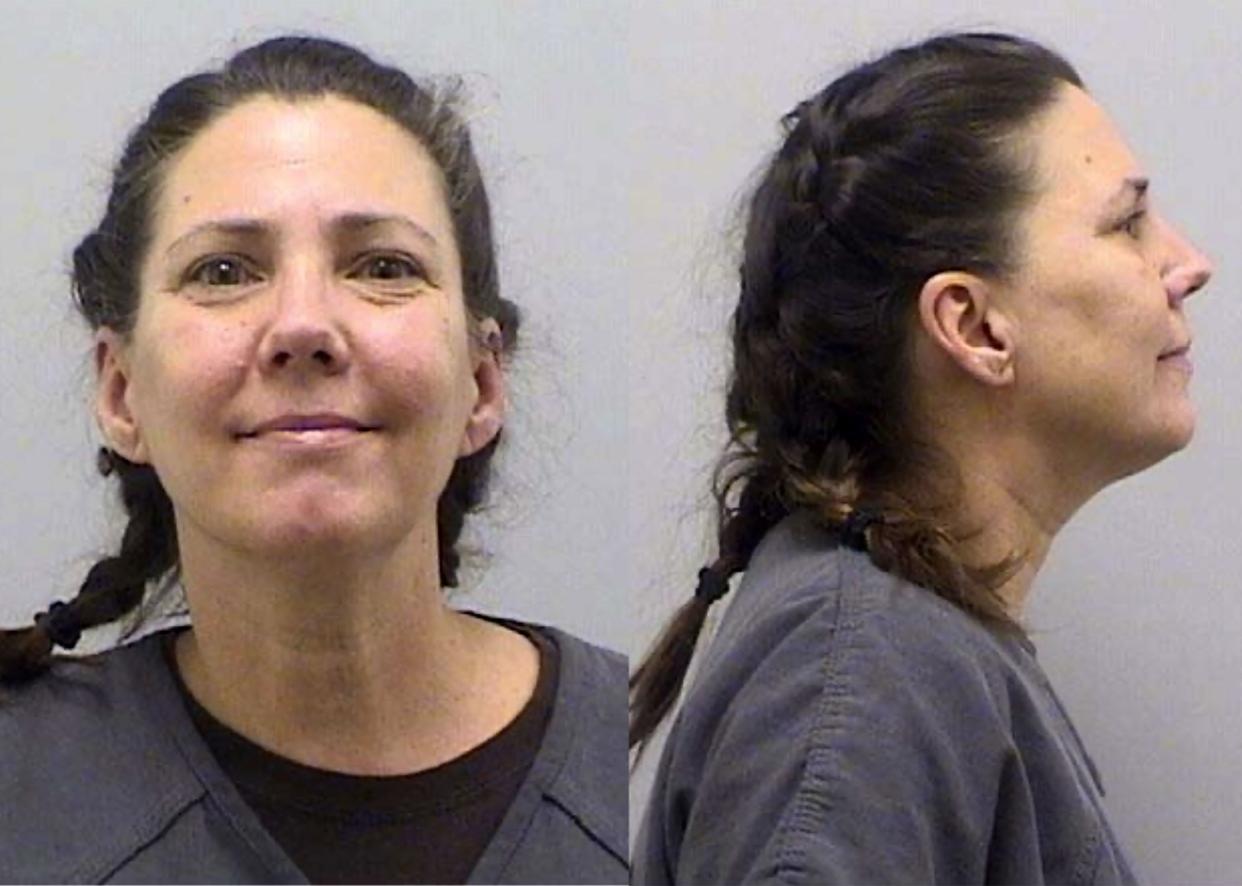 This undated booking photo provided by the Douglas County Sheriff's Office, in Colorado, shows Cynthia Abcug. 