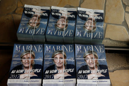 Political leaflets for Marine Le Pen, French National Front (FN) political party leader and candidate for French 2017 presidential election, are seen at her local headquarters in Henin-Beaumont, France, April 6, 2017. REUTERS/Pascal Rossignol