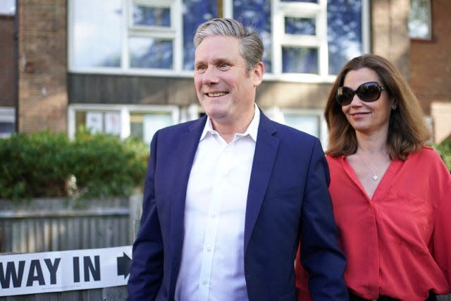 Sir Keir Starmer and his wife Victoria at the TRA Hall, London