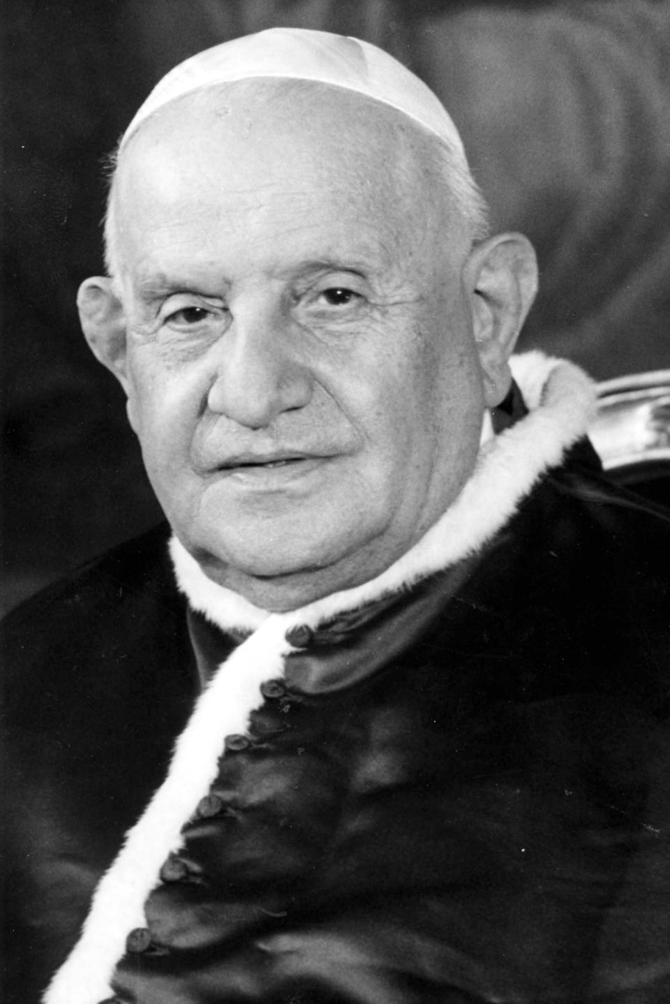 FILE - This is a 1962 file portrait of late Pope John XXIII. While much of the focus of Sunday's dual canonization will be on Pope John Paul II's globe-trotting, 26-year papacy and his near-record sprint to sainthood, many older Catholics will be celebrating the short but historic pontificate of the "Good Pope," John XXIII. (AP Photo/File)