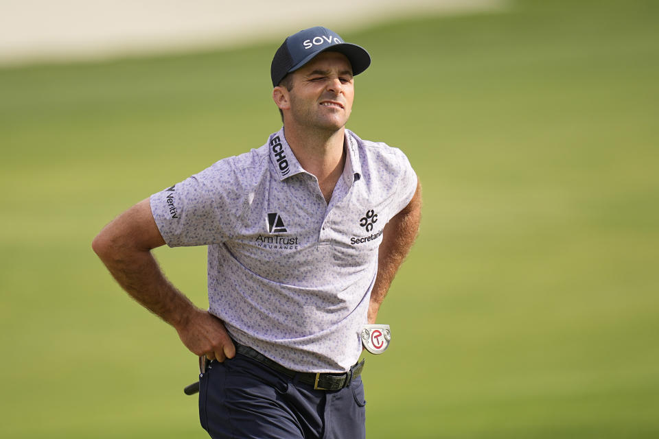 Denny McCarthy reacts to missing a birdie putt on the 18th hole during the third round of the Texas Open golf tournament, Saturday, April 6, 2024, in San Antonio. (AP Photo/Eric Gay)