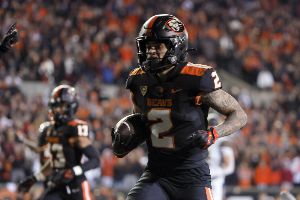Nov 12, 2022; Corvallis, Oregon, USA; Oregon State Beavers wide receiver <a class="link " href="https://sports.yahoo.com/ncaaf/players/299119" data-i13n="sec:content-canvas;subsec:anchor_text;elm:context_link" data-ylk="slk:Anthony Gould;sec:content-canvas;subsec:anchor_text;elm:context_link;itc:0">Anthony Gould</a> (2) runs the ball for a touchdown during the first half against the California Golden Bears at Reser Stadium. Mandatory Credit: Soobum Im-USA TODAY Sports
