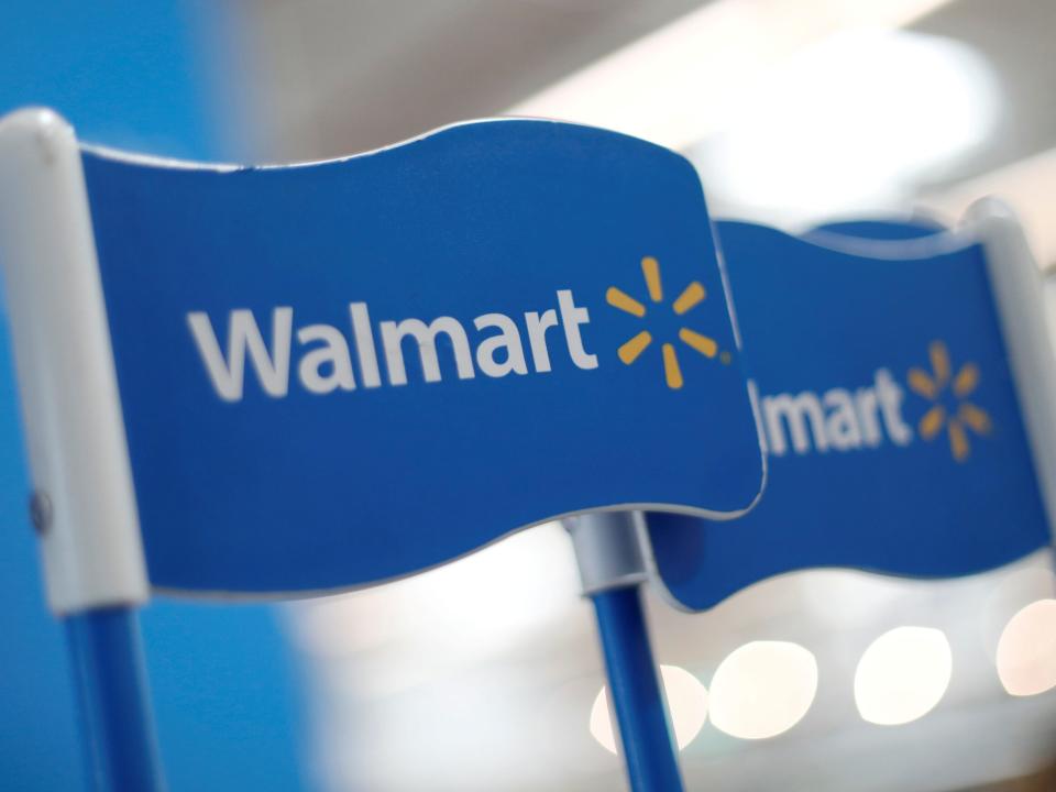 FILE PHOTO: Walmart signs are displayed inside a Walmart store in Mexico City, Mexico March 28, 2019. REUTERS/Edgard Garrido/File Photo