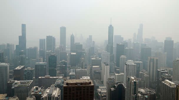 PHOTO: Chicago's skyline is seen from the 360 Chicago Observation Deck of the John Hancock Building with heavy smoke from Canadian wildfires blanketing the city on June 27, 2023. (Kamil Krzaczynski/AFP via Getty Images)
