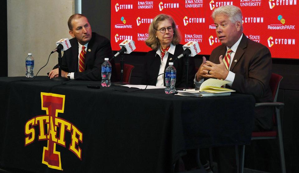 Iowa State president Wendy Wintersteen is flanked by athletics director Jamie Pollard (left) and Research Park CEO Rick Sanders during Monday's announcement of the school's CYTown vision.