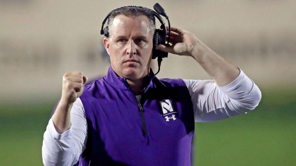 PHOTO: FILE - Northwestern coach Pat Fitzgerald pumps his fist after a touchdown against Michigan State, Sept. 3, 2021, at Ryan Field in Evanston, Illinois. (Chris Sweda/Chicago Tribune/Tribune News Service via Getty Images, FILE)