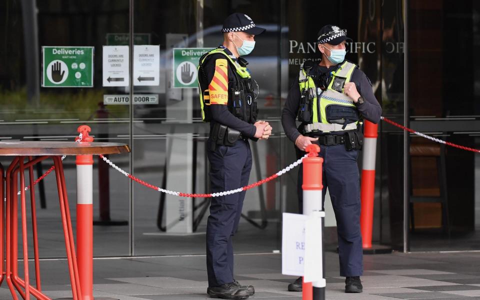 Police outside a quarantine hotel in Melbourne, Australia - Getty