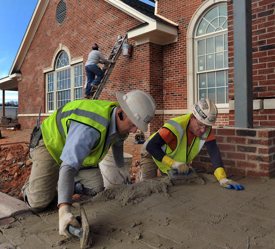 McGee Brothers Company, Inc. lay brick at an entrance way of the newest location of Thomas McAfee Funeral Home.
Construction work continues at the Thomas McAfee Funeral Home at its new Southeast Chapel location at 1604 NE Main Street in Simpsonville.