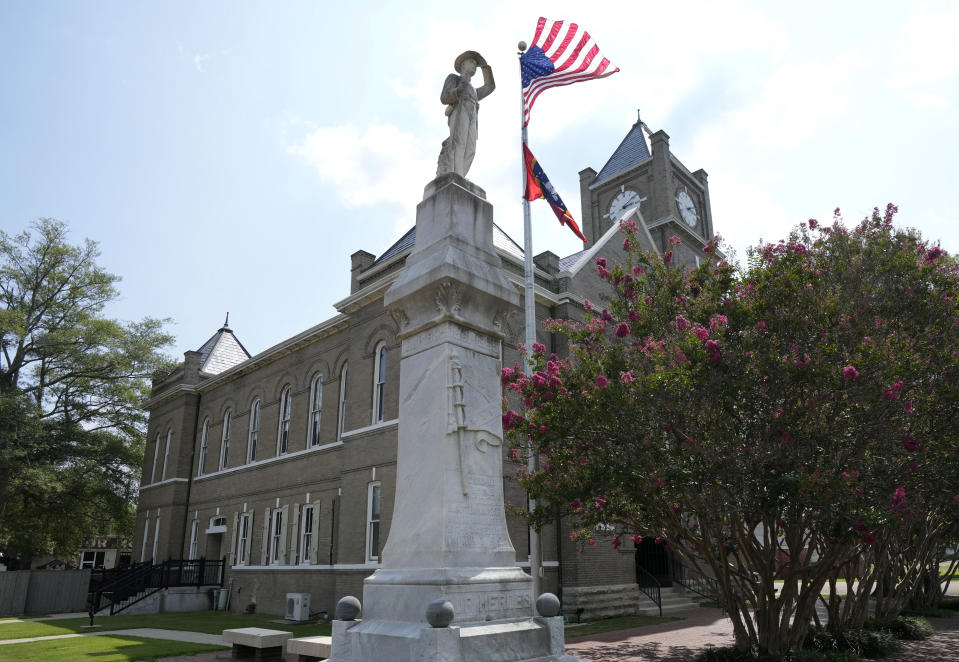 A Confederate soldier monument stands outside the Tallahatchie County Courthouse Monday, July 24, 2023, in Sumner, Miss. President Joe Biden is expected to create a national monument honoring Emmett Till, the Black teenager from Chicago who was abducted, tortured and killed in 1955 after he was accused of whistling at a white woman in Mississippi, and his mother Mamie Till-Mobley. The Mississippi locations are Graball Landing, the spot where Emmett’s body was pulled from the Tallahatchie River just outside of Glendora, Miss., and the Tallahatchie County Second District Courthouse, where Emmett’s killers were tried. (AP Photo/Rogelio V. Solis)