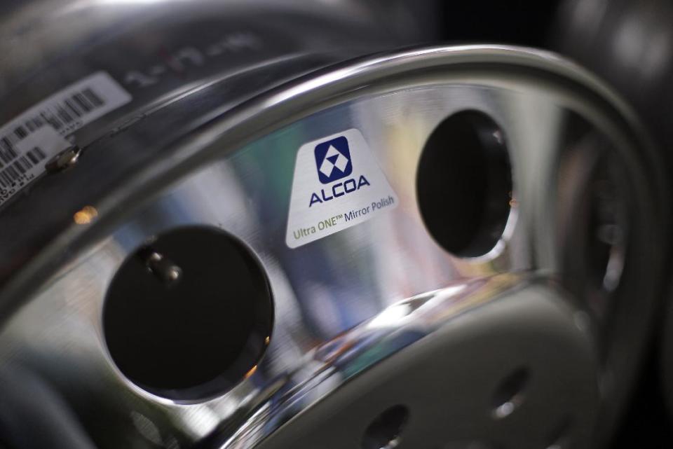 In this April 7, 2014 photo, Alcoa's 22.5" aluminum Ultra One Truck Wheel with MagnaForce alloy is on display at Alcoa's headquarters in Pittsburgh. Alcoa is expected to report quarterly financial results after the market closes on Tuesday, April 8, 2014. (AP Photo/Gene J. Puskar)