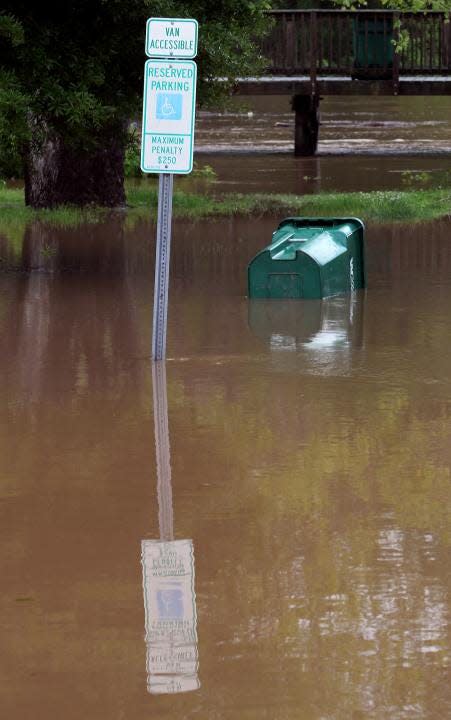 (Photo by John Clark/The Gazette) Flooding has already started around Riverside Park in Cramerton on Monday, May 6, 2013.