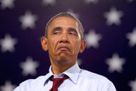 <p>President Barack Obama pauses while speaking at a campaign event, Saturday, Aug. 18, 2012, in Windham, N.H., at Windham High School. (AP Photo/Carolyn Kaster) </p>