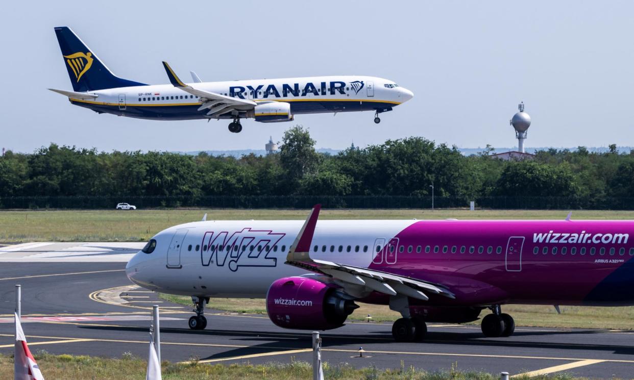 <span>Ryanair and Wizz Air are among the airlines that publish a monthly average of their CO2 emissions per passenger journey.</span><span>Photograph: Márton Mónus/Reuters</span>