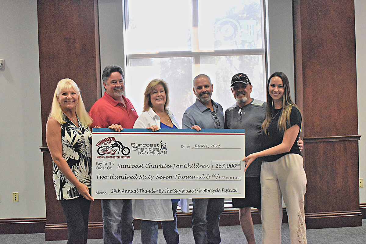 The 24th annual Thunder By The Bay Music & Motorcycle Festival raised $267,000 for Suncoast Charities for Children. From left, Suncoast Charities executive director Lucy Nicandri, board members Simon Williams, Maureen McAuley, Greg Linehan, Bob Morrison, and director of special events Lisa Baer.