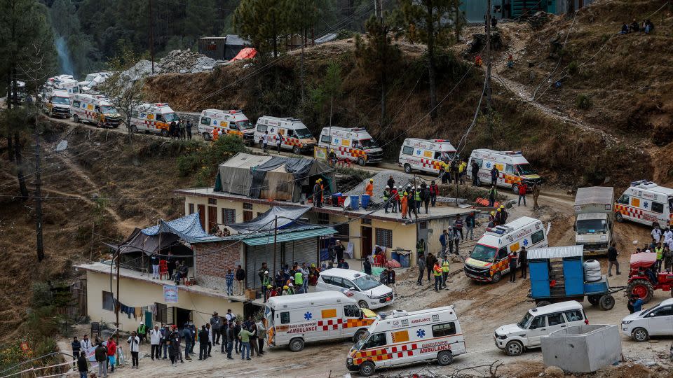 Ambulances wait in line near the operation to free the trapped workers in Uttarakhand, India, November 28, 2023. - Francis Mascarenhas/Reuters