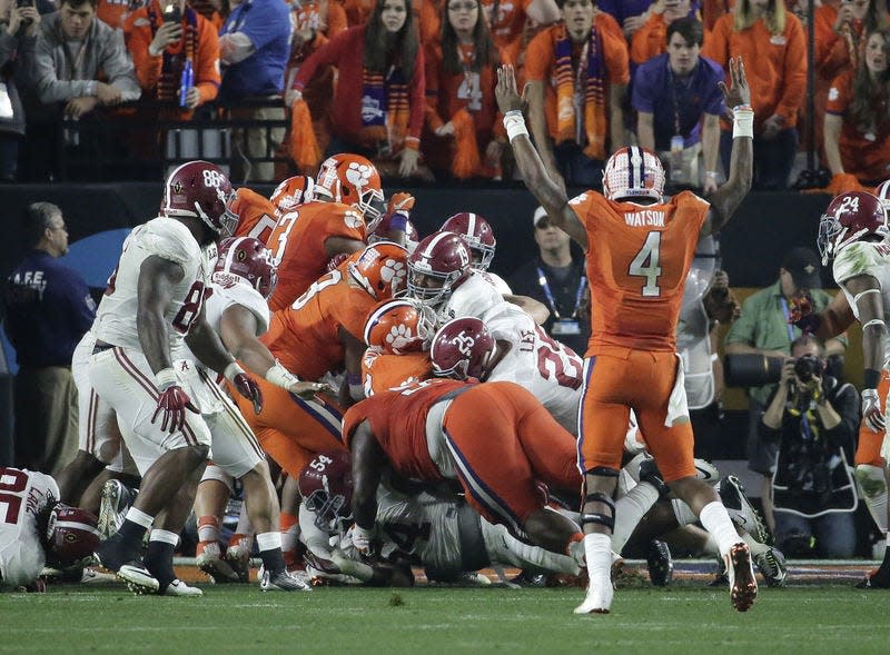 Clemson's Deshaun Watson (4) celebrates a touchdown during the second half of the NCAA college football playoff championship game against Alabama Monday, Jan. 11, 2016, in Glendale, Ariz. (AP Photo/Chris Carlson)