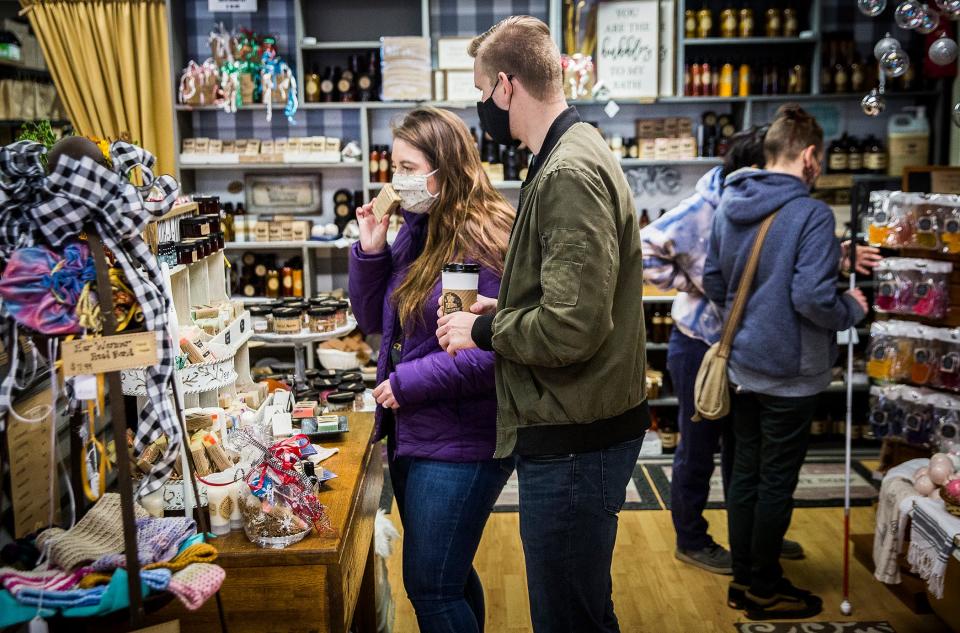 Customers shop at Debbie's Handmade Soap on Walnut Street during Small Business Saturday in 2020.