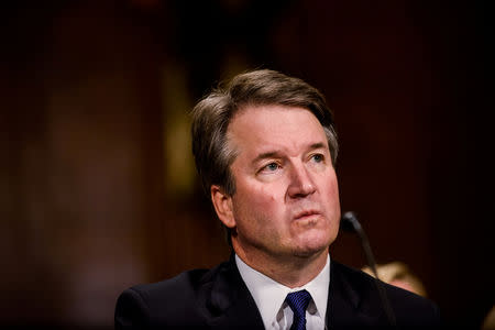 FILE PHOTO: Judge Brett M. Kavanaugh testifies in front of the Senate Judiciary committee regarding sexual assault allegations at the Dirksen Senate Office Building on Capitol Hill in Washington DC, U.S., September 27, 2018. Gabriella Demczuk/Pool via REUTERS/File Photo