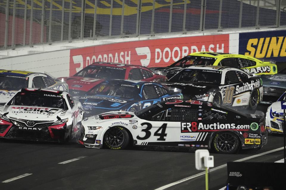 NASCAR Cup Series driver Michael McDowell (34) spins out during the Busch Light Clash NASCAR exhibition auto race at Los Angeles Memorial Coliseum Sunday, Feb. 5, 2023, in Los Angeles. (AP Photo/Mark J. Terrill)