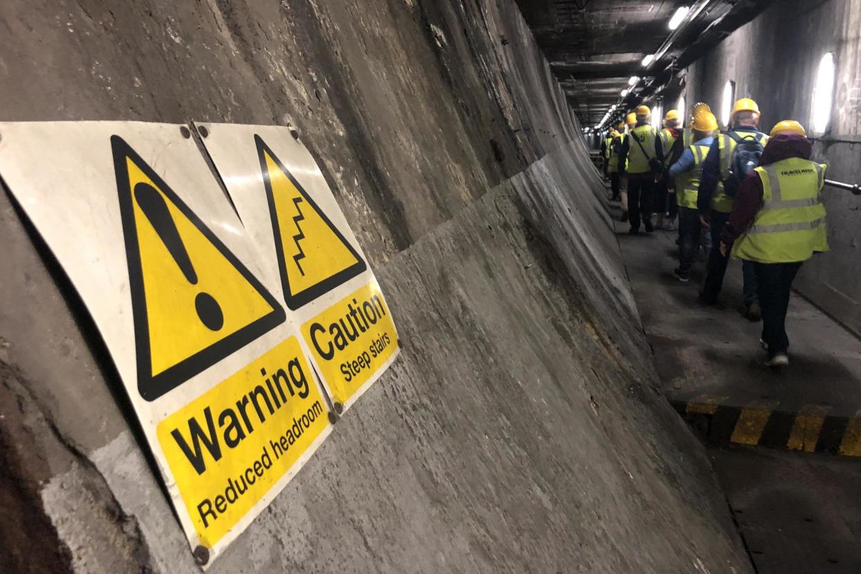 Traffic trek: beneath the vehicle lanes in the Queensway Tunnel: Simon Calder