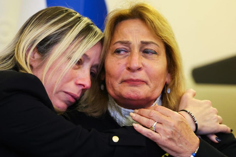 Avivit Yablonka, sister of Chanan Yablonka, 42, and Orit Meir, mother of Almog Meir, 21, whose family members are being held hostage by Palestinian Islamist group Hamas, react as they speak to the media at the Israeli embassy, as the conflict between Israel and the Palestinian Islamist group Hamas continues, in London, Britain, March 7, 2024.  