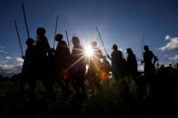 Maasai Moran athletes from Mbirikani Manyatta arrive for the 2018 Maasai Olympics at the Sidai Oleng Wildlife Sanctuary, at the base of Mt. Kilimanjaro, near the Kenya-Tanzania border in Kimana, Kajiado, Kenya December 14, 2018. Picture taken December 14, 2018. REUTERS/Thomas Mukoya