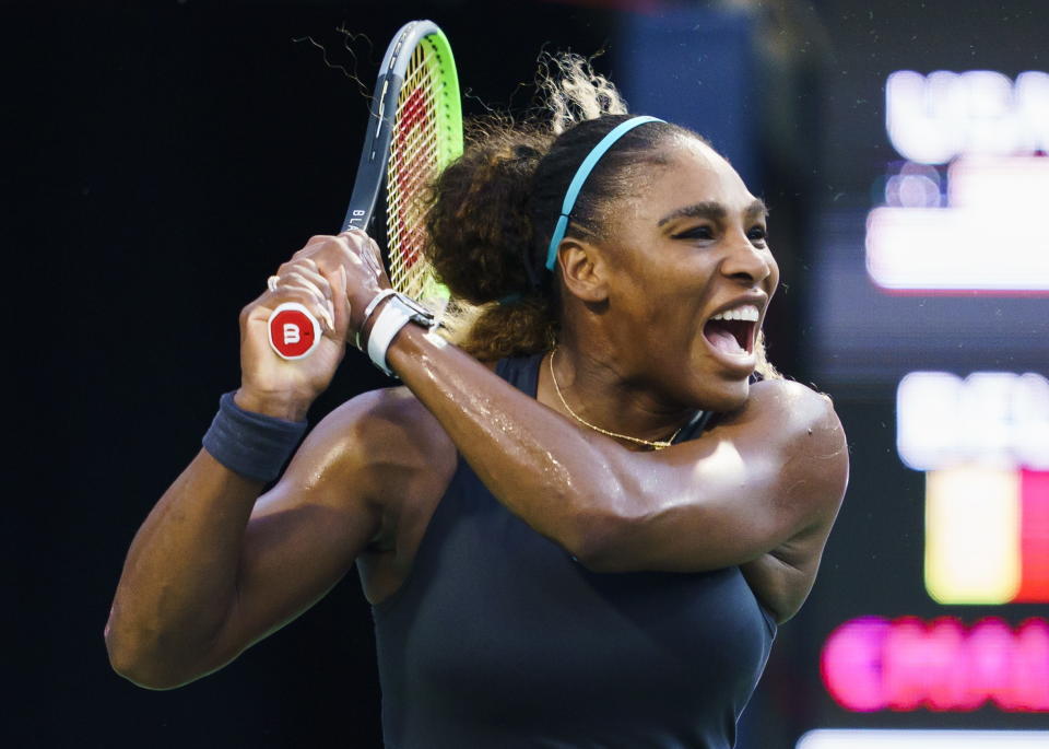 Serena Williams, of the United States, follows through on a return to Elise Mertens, of Belgium, during the Rogers Cup women’s tennis tournament Wednesday, Aug. 7, 2019, in Toronto. (Mark Blinch/The Canadian Press via AP)