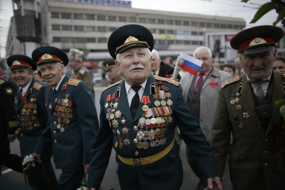 WWII veterans take part in the May Day march in Simferopol, Crimean capital on Thursday, May 1, 2014. (AP Photo/Max Vetrov)