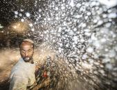 Israeli police use water cannon during heavy clashes, to disperse Ethiopian Israelis demonstrating in central Tel Aviv against alleged police brutality