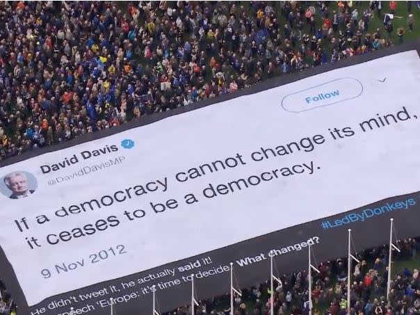 Brexit protesters unfurl giant banner mocking David Davis during Put It To The People March