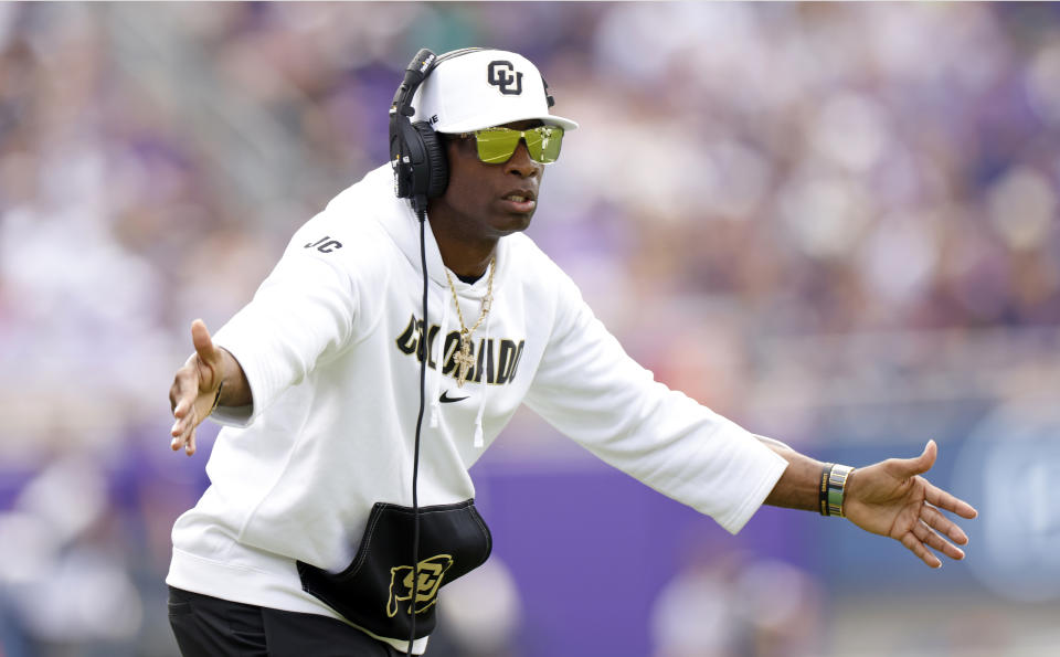 Colorado head coach Deion Sanders celebrates a touchdown against TCU on Saturday in Fort Worth, Texas. (Photo by Ron Jenkins/Getty Images)
