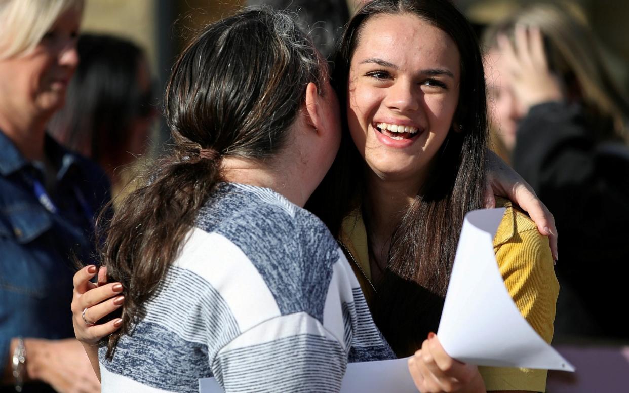 A student sees her GCSE results at Crossley Heath Grammar School in Halifax - Molly Darlington/Reuters