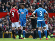 Tyrone Mings is sent off for an alleged stamp on Zlatan Ibrahimovic.