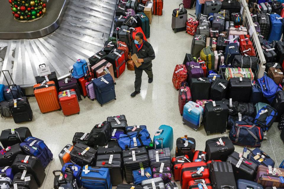 Mountains of bags are seen at Chicago Midway International Airport after flight cancellations (REUTERS)