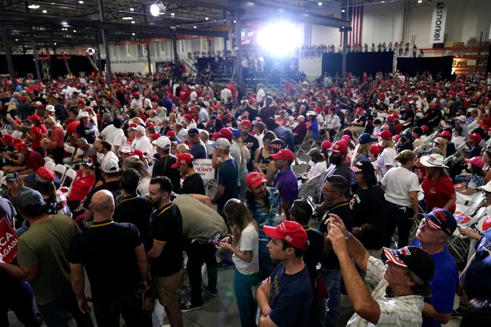 Supporters wait for President Donald Trump to speak at a rally Sunday in Henderson, Nevada.