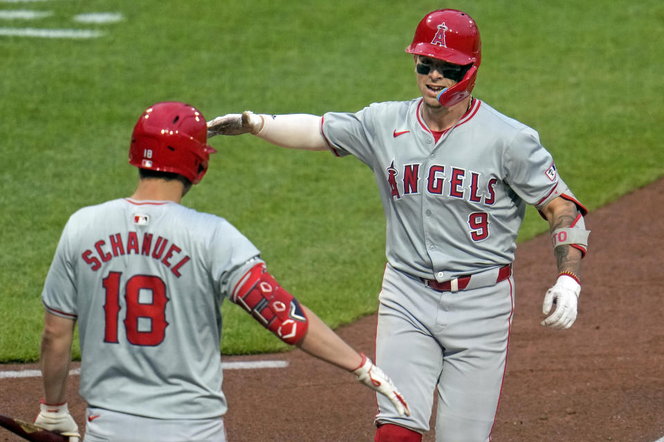 Los Angeles Angels' Zach Neto (9) is greeted by Nolan Schanuel (18) as he heads to the dugout after hitting a solo home run off Pittsburgh Pirates starting pitcher Mitch Keller during the sixth inning of a baseball game in Pittsburgh, Monday, May 6, 2024. (AP Photo/Gene J. Puskar)