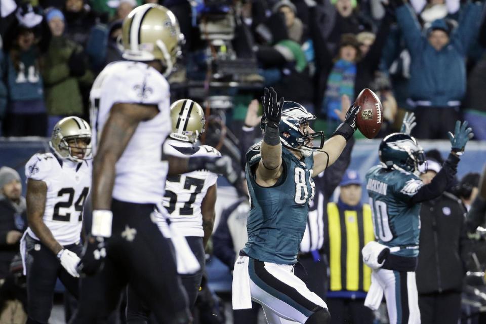 Philadelphia Eagles' Zach Ertz (86) celebrates after scoring a touchdown during the second half of an NFL wild-card playoff football game against the New Orleans Saints, Saturday, Jan. 4, 2014, in Philadelphia. (AP Photo/Matt Rourke)