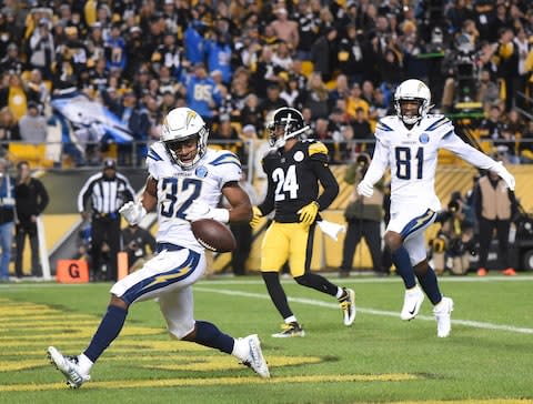 Los Angeles Chargers running back Justin Jackson (32) scores a fourth quarter touchdown against the Pittsburgh Steelers at Heinz Field - Credit: Philip G. Pavely/USA TODAY