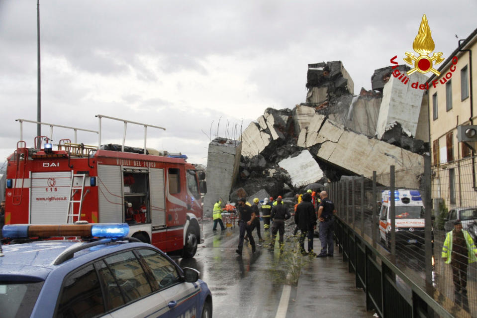 <em>Rescuers rush to the scene in northern Italy. (Reuters)</em>