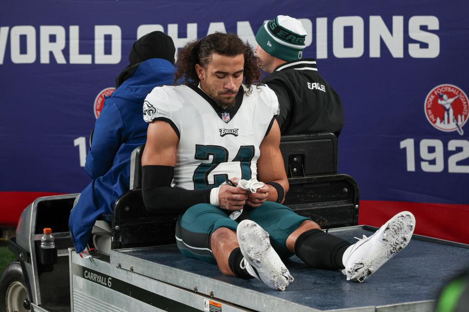 Jan 7, 2024; East Rutherford, New Jersey, USA; Philadelphia Eagles safety Sydney Brown (21) is carted off the field after an injury during the first half against the New York Giants at MetLife Stadium. Mandatory Credit: Vincent Carchietta-USA TODAY Sports