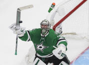 Dallas Stars goalie Anton Khudobin bats the puck out of the air during the second period against the Vegas Golden Knights in Game 4 of the NHL hockey Western Conference final, Saturday, Sept. 12, 2020, in Edmonton, Alberta. (Jason Franson/The Canadian Press via AP)