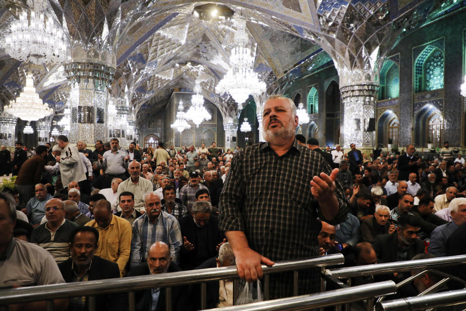 Iranian pilgrims pray for President Ebrahim Raisi at Imam Reza Shrine in the city of Mashhad, Sunday, May 19, 2024. A helicopter carrying Iranian President Raisi suffered a "hard landing" on Sunday, Iranian state media reported, without elaborating. (Mohammad Hasan Salavati/Shahraranews via AP)