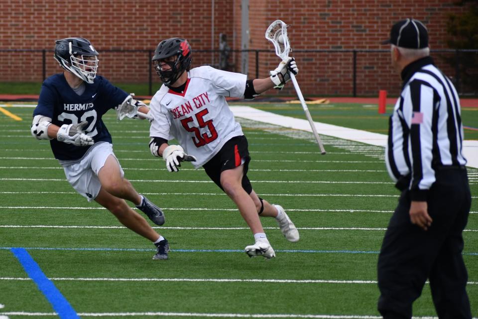 Ocean City senior Cole Young drives against St. Augustine junior Jack Schleicher