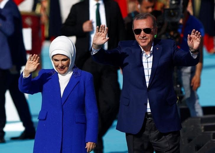 Turkish President Tayyip Erdogan, accompanied by his wife Emine Erdogan, greets supporters during a rally to mark the 563rd anniversary of the conquest of the city by Ottoman Turks, in Istanbul, Turkey, May 29, 2016. REUTERS/Murad Sezer