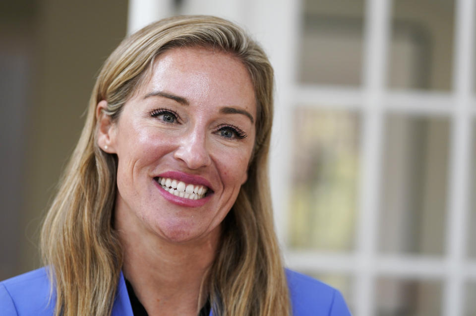 Nurse Practitioner and former Democratic candidate for the Virginia House of Delegates, Susanna Gibson, smiles during an interview at her home Wednesday Nov. 15, 2023, in Henrico, Va. (AP Photo/Steve Helber)