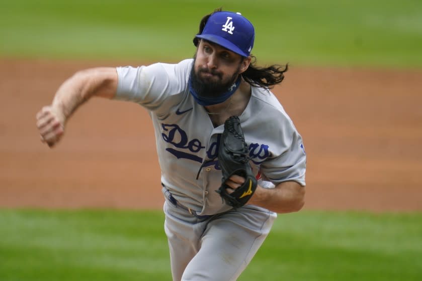 Los Angeles Dodgers starting pitcher Tony Gonsolin works against the Colorado Rockies.